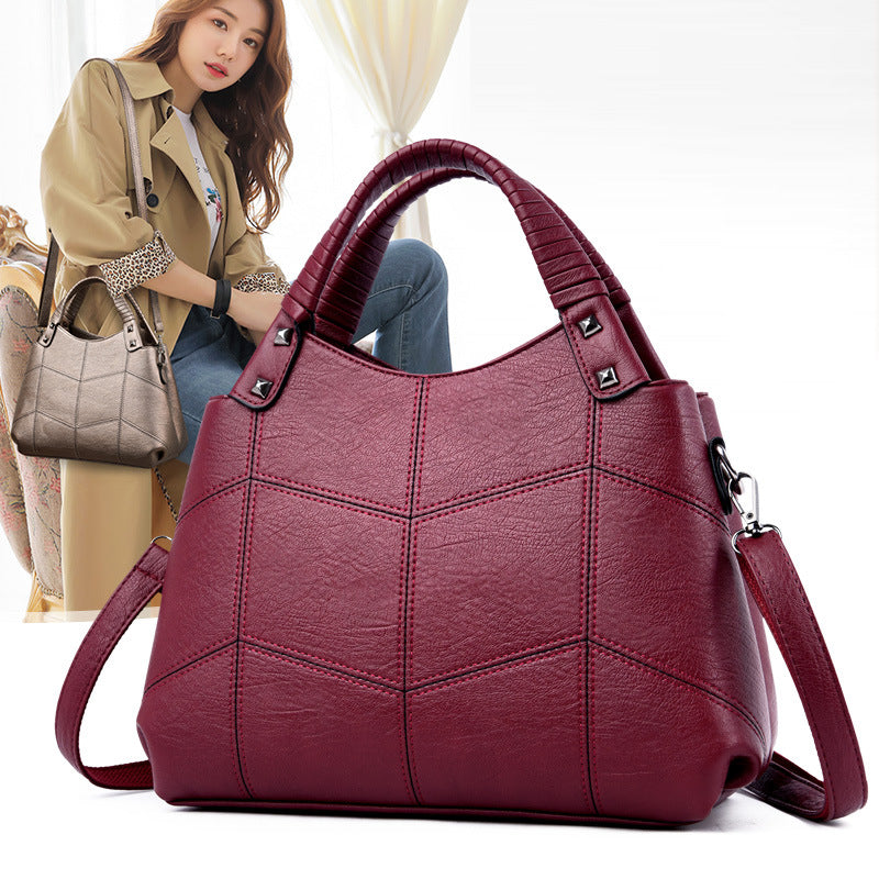 Leather handle shoulder bag