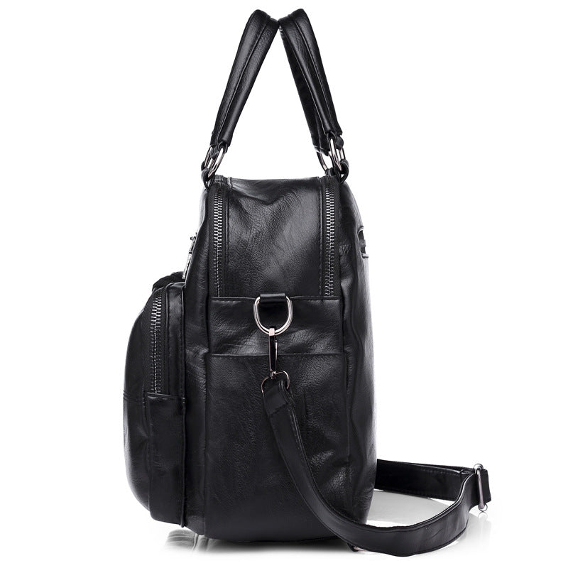 Soft leather spliced shoulder bag