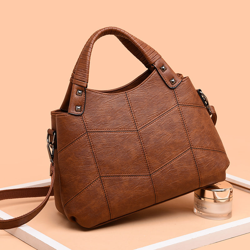 Leather handle shoulder bag